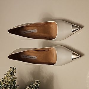 Saks white leather pumps